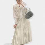 Yasmin | Ráncolt Pliszé Szoknya" can be rewritten as "Yasmin | Ruffled Pleated Skirt.