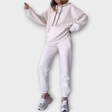 "Lucia | Lahtise lõikega dressikomplekt" can be rewritten as "Lucia | Relaxed Fit Tracksuit Set".