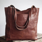 "Pärand | Bőr Tote Táska" can be rewritten as "Pärand | Bőr Tote Táska - Elegáns és Tartós" (Pärand | Leather Tote Bag - Elegant and Durable) if you want to add a descriptive touch. If you prefer a simpler variation, you could say "Pärand | Bőr Tote Táska