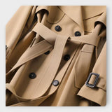 Merike | Klasszikus hosszú trench coat övvel" can be rewritten as: "Merike | Elegáns hosszú trench coat övvel