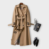 Merike | Klasszikus hosszú trench coat övvel" can be rewritten as: "Merike | Elegáns hosszú trench coat övvel
