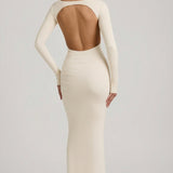 "Ivory Színű, Ráncolt, Háton Nyitott Maxi Ruha" can be rewritten as "Ivory Ruffled Open-Back Maxi Dress".