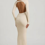 "Ivory Színű, Ráncolt, Háton Nyitott Maxi Ruha" can be rewritten as "Ivory Ruffled Open-Back Maxi Dress".