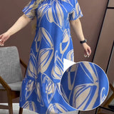 Elegáns kerek nyakú, nyomtatott Flowy ruha