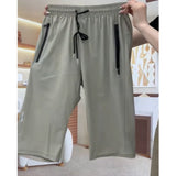 🔥Női Kényelmes Gyorsszáradó Stretch Capri Nadrág🔥