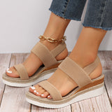 Női Woven Elastic Strap Vastag Talpú Wedge Szandál" can be rewritten as:

"Női Széles Talpú Wedge Szandál Woven Elastic Pánttal