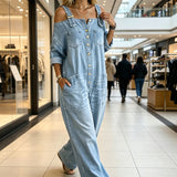 Széles szárú, laza szabású overall jumpsuit zsebekkel